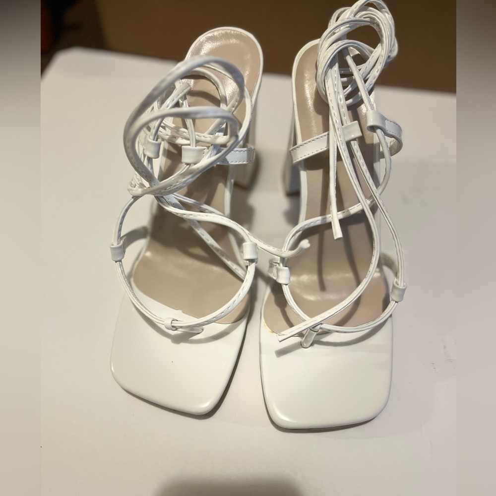 White lace up block heels.